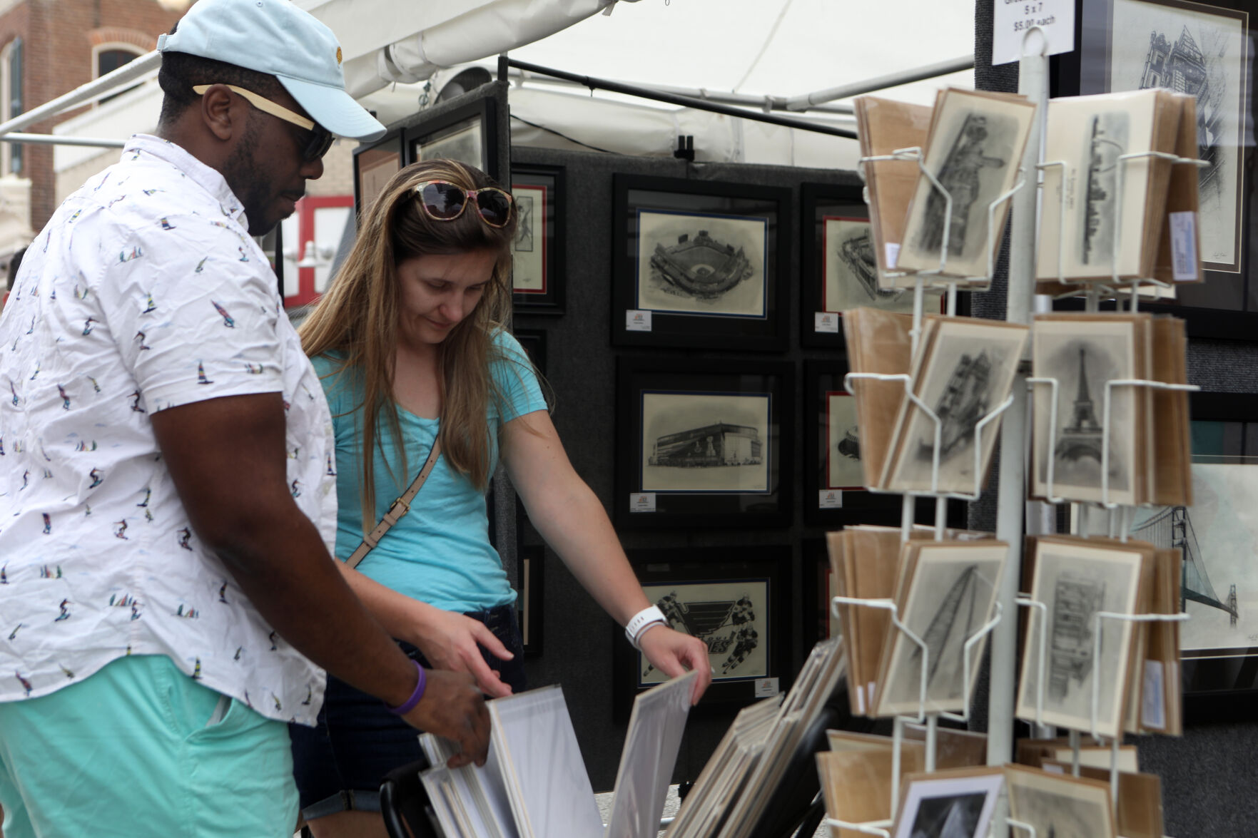 Kyle Joyner and Kelsey Staiger browse art